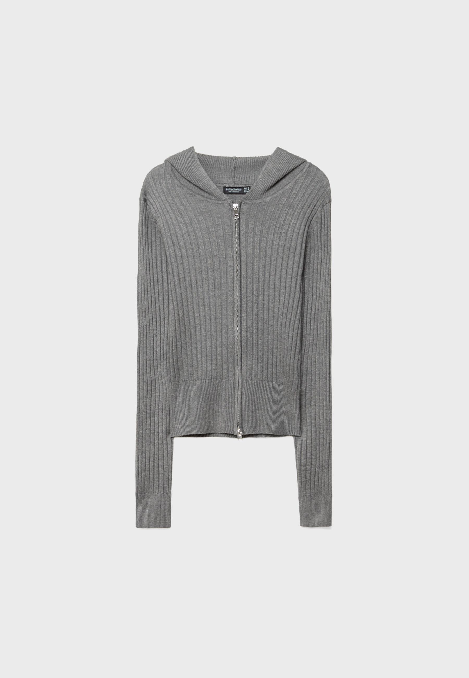 Front view of gray zip-up hooded sweater, ribbed design.