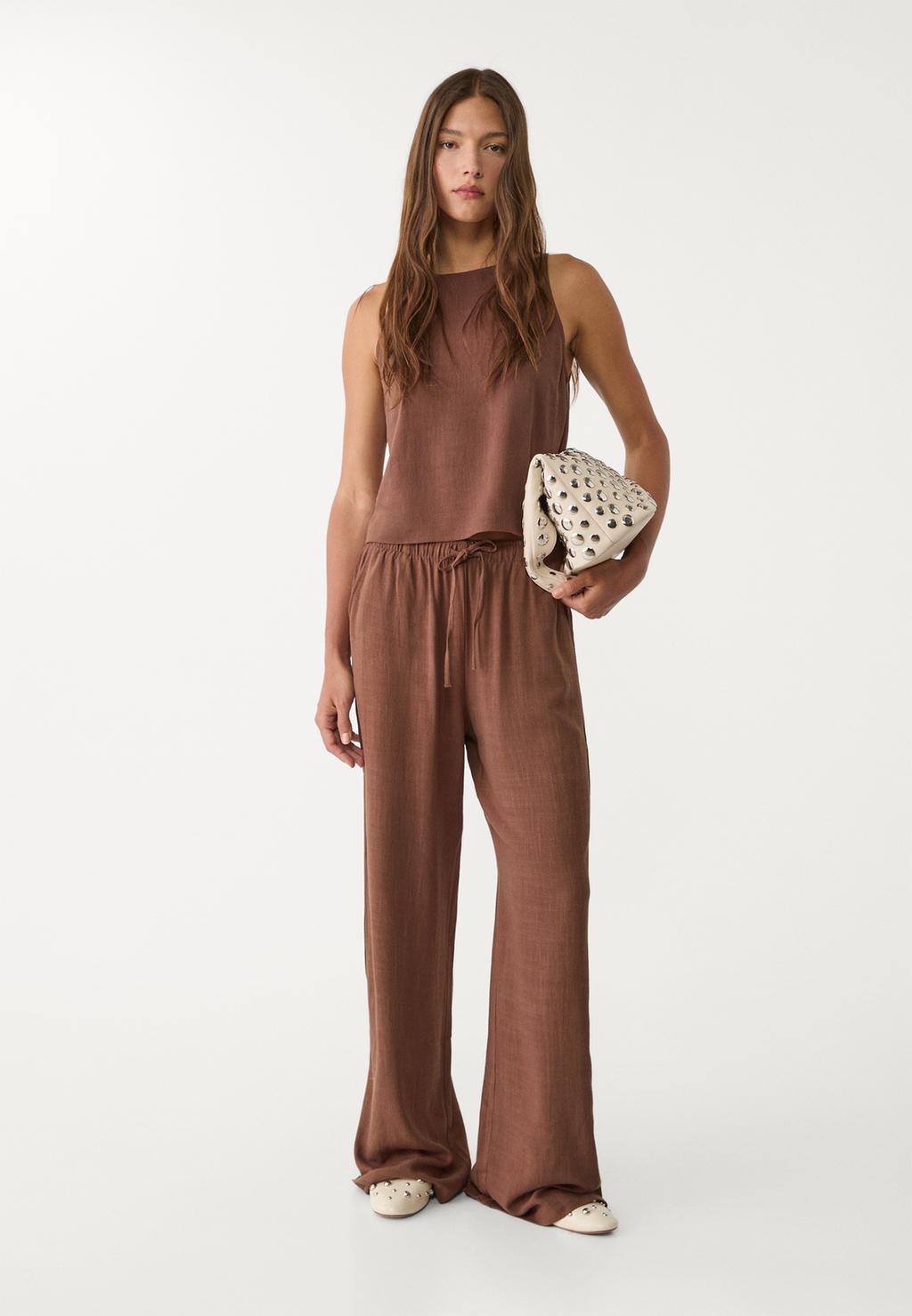 Loose-fitting linen blend trousers