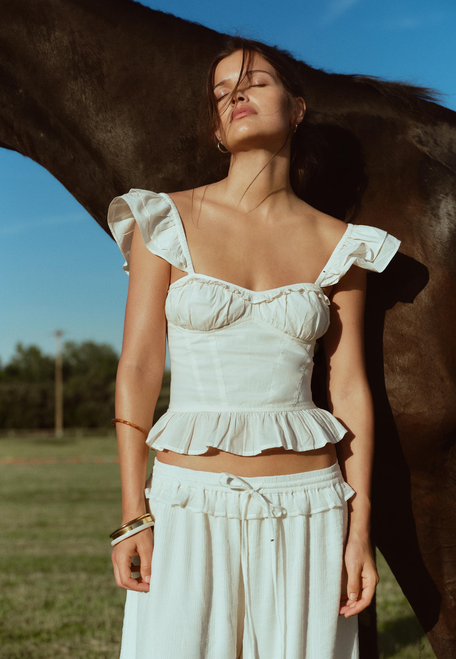Ruffled corsetry-inspired top — Ecru