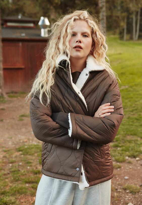 combinatiejack met omkeerbaar synthetisch teddy effect