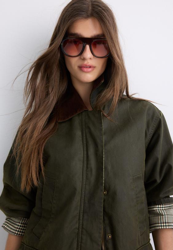 parka encerada multi bolsillos
