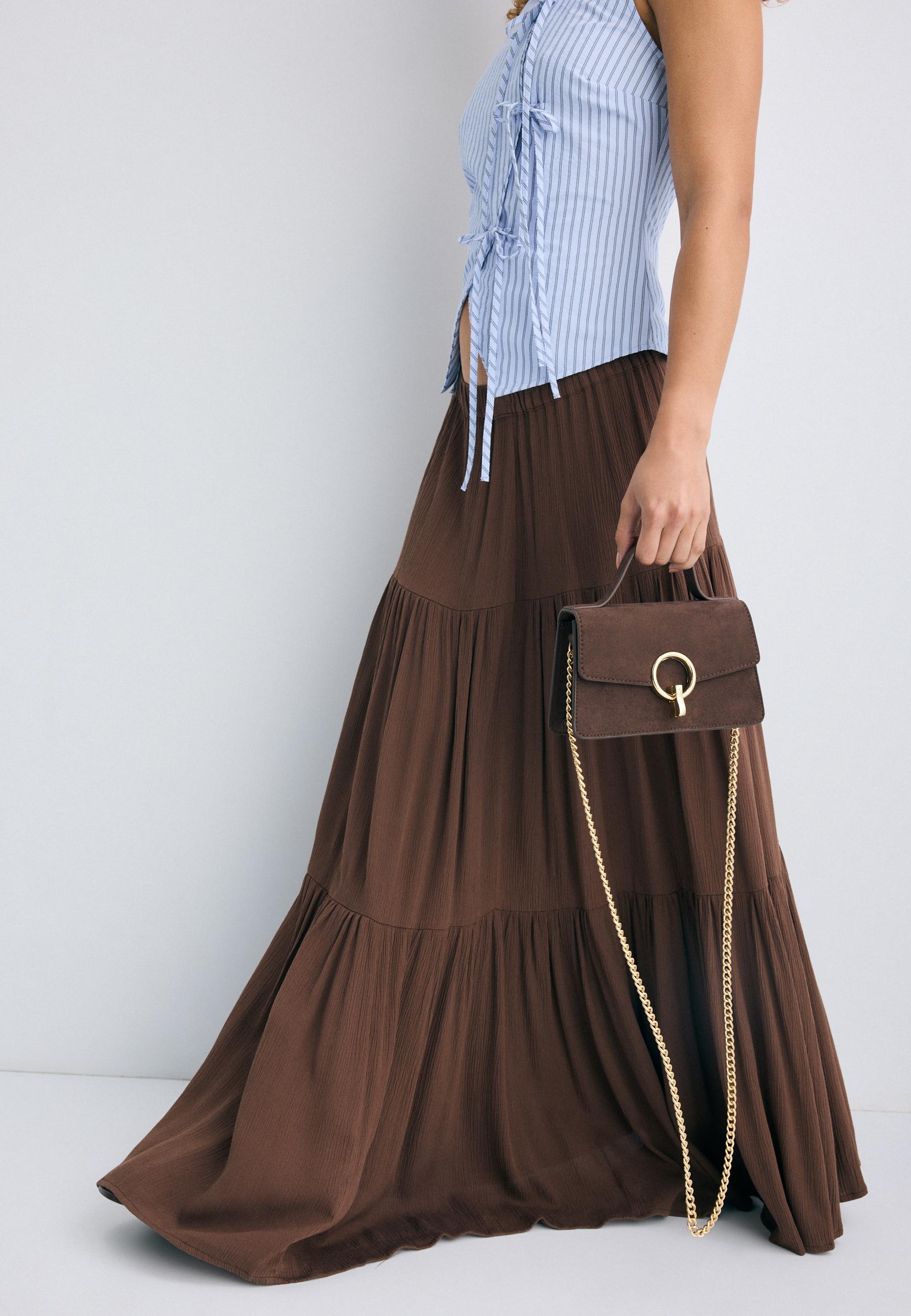 Crossbody bag with a round clasp — Brown