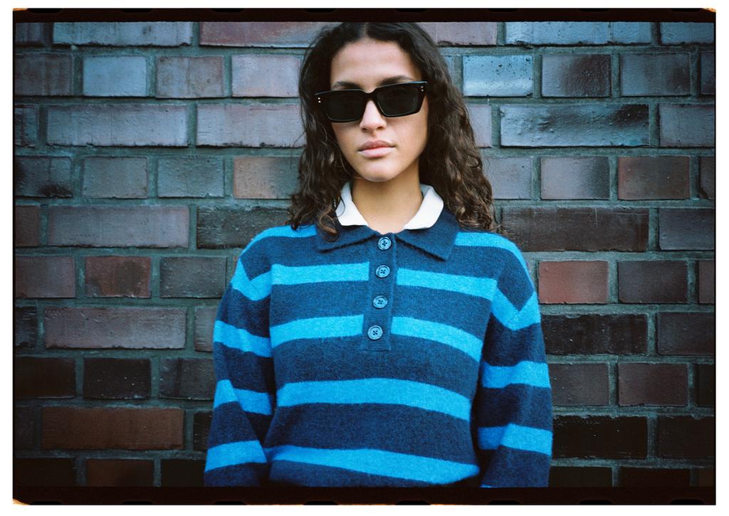 سويتر بولو مقلّم محاك