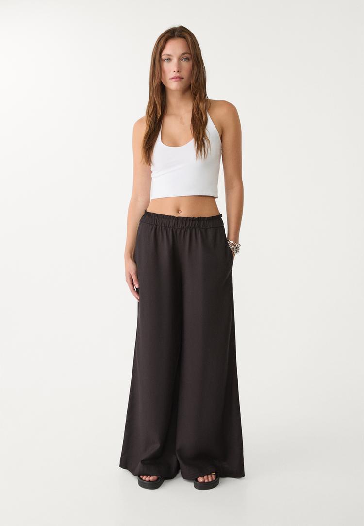 pantalon palazzo fluido con lino