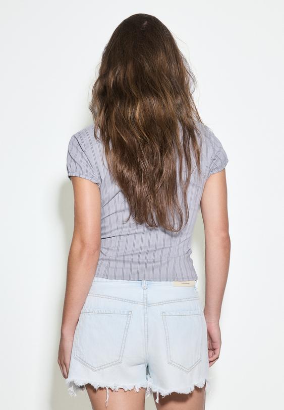 d75 shorts in denim strappati