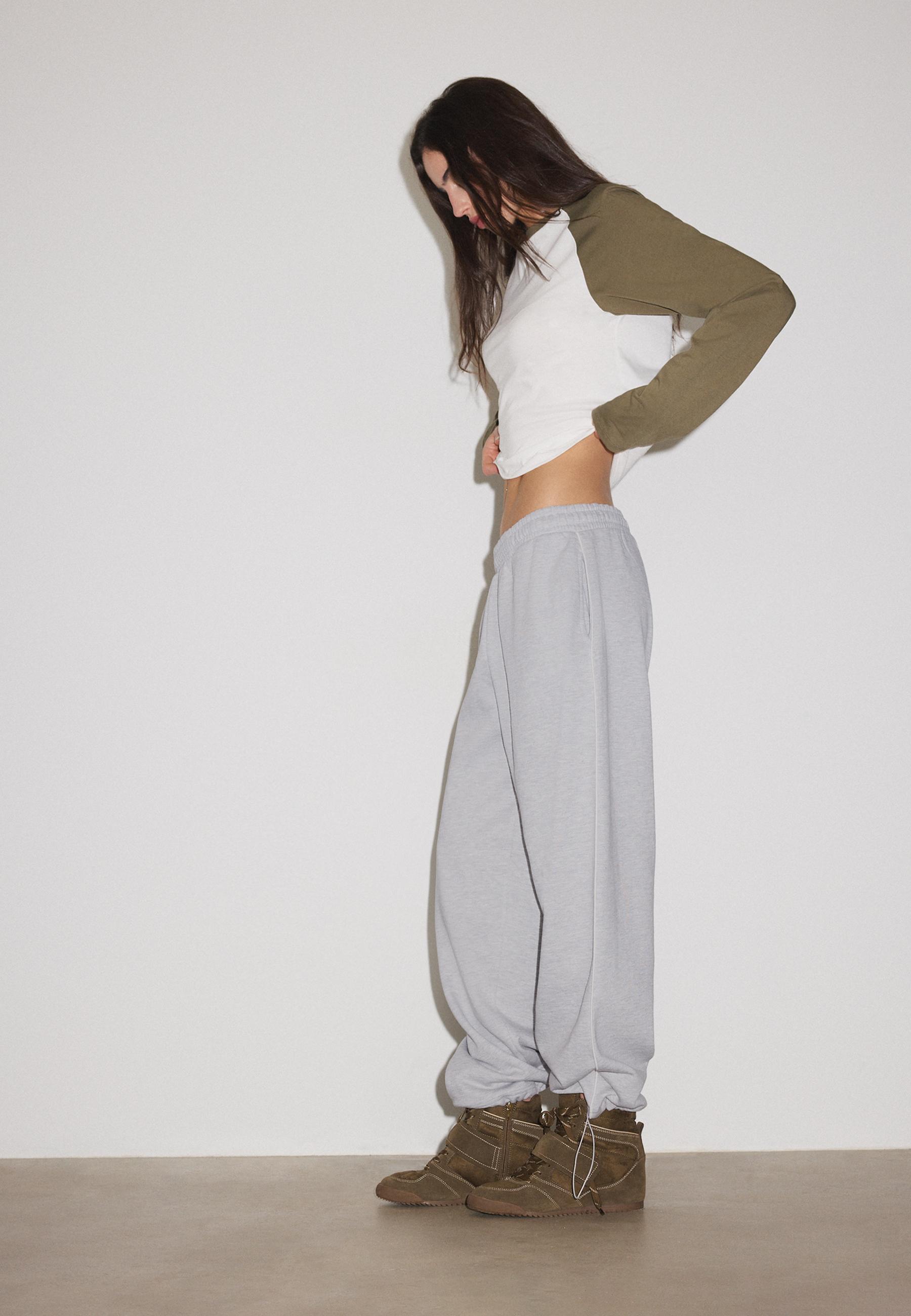 Plush joggers with piping and toggles — Grey melange