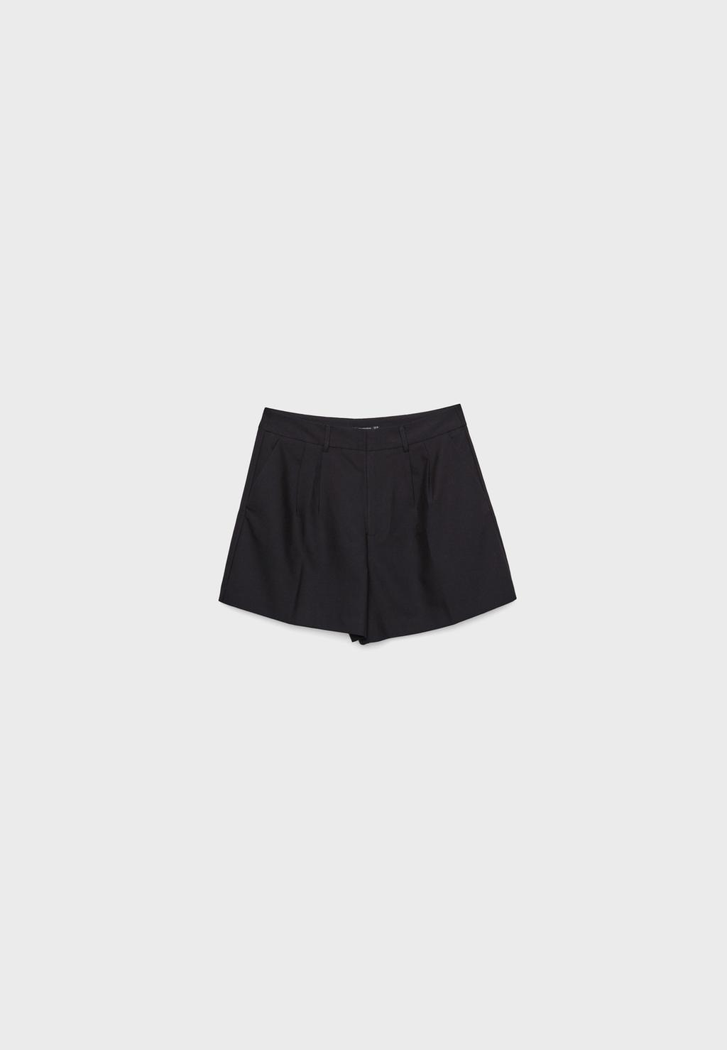 Pantalons curts de vestir amb pinces