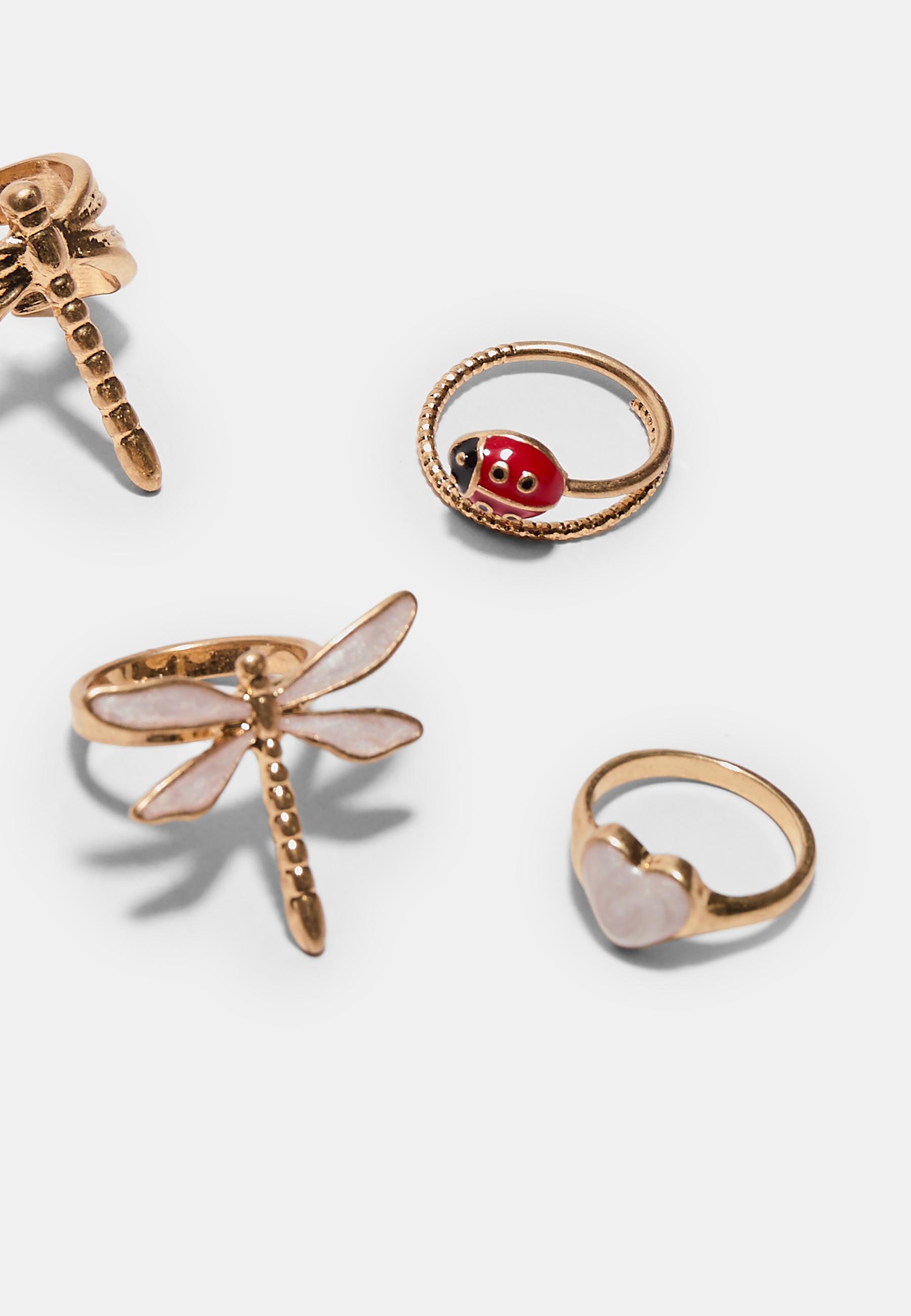 Set of 4 dragonfly rings — Gold