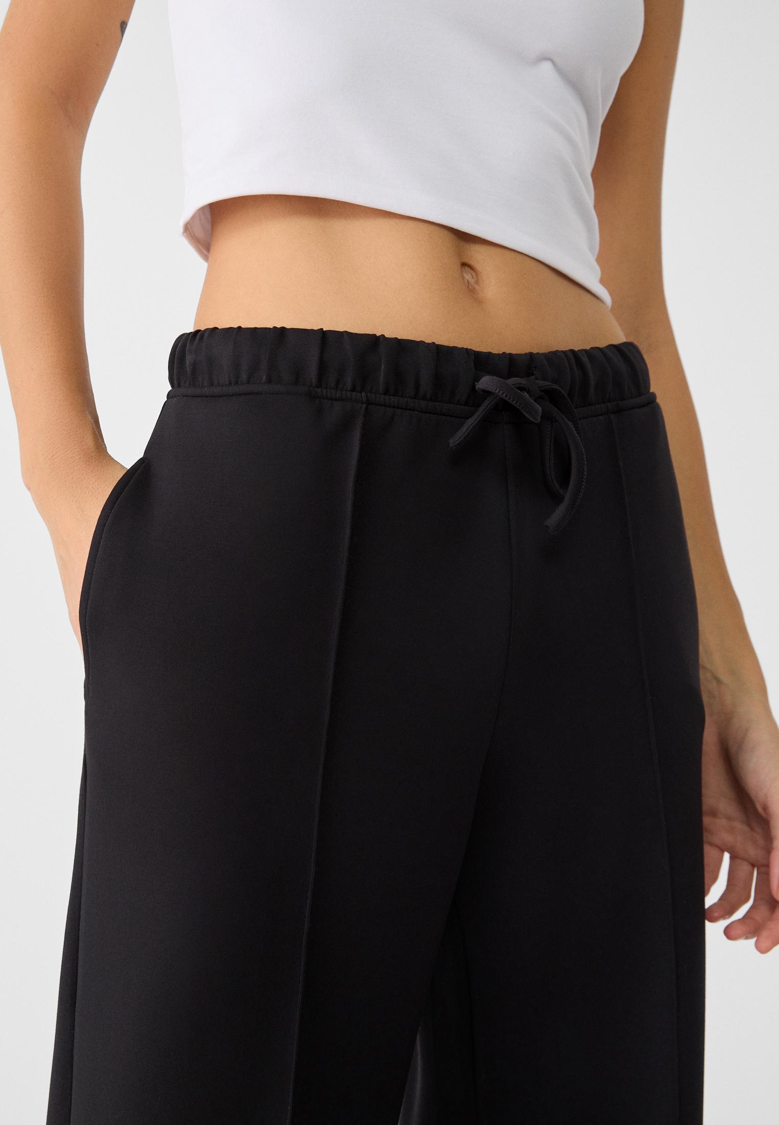 Soft-touch wide-leg pin-tuck joggers — Black