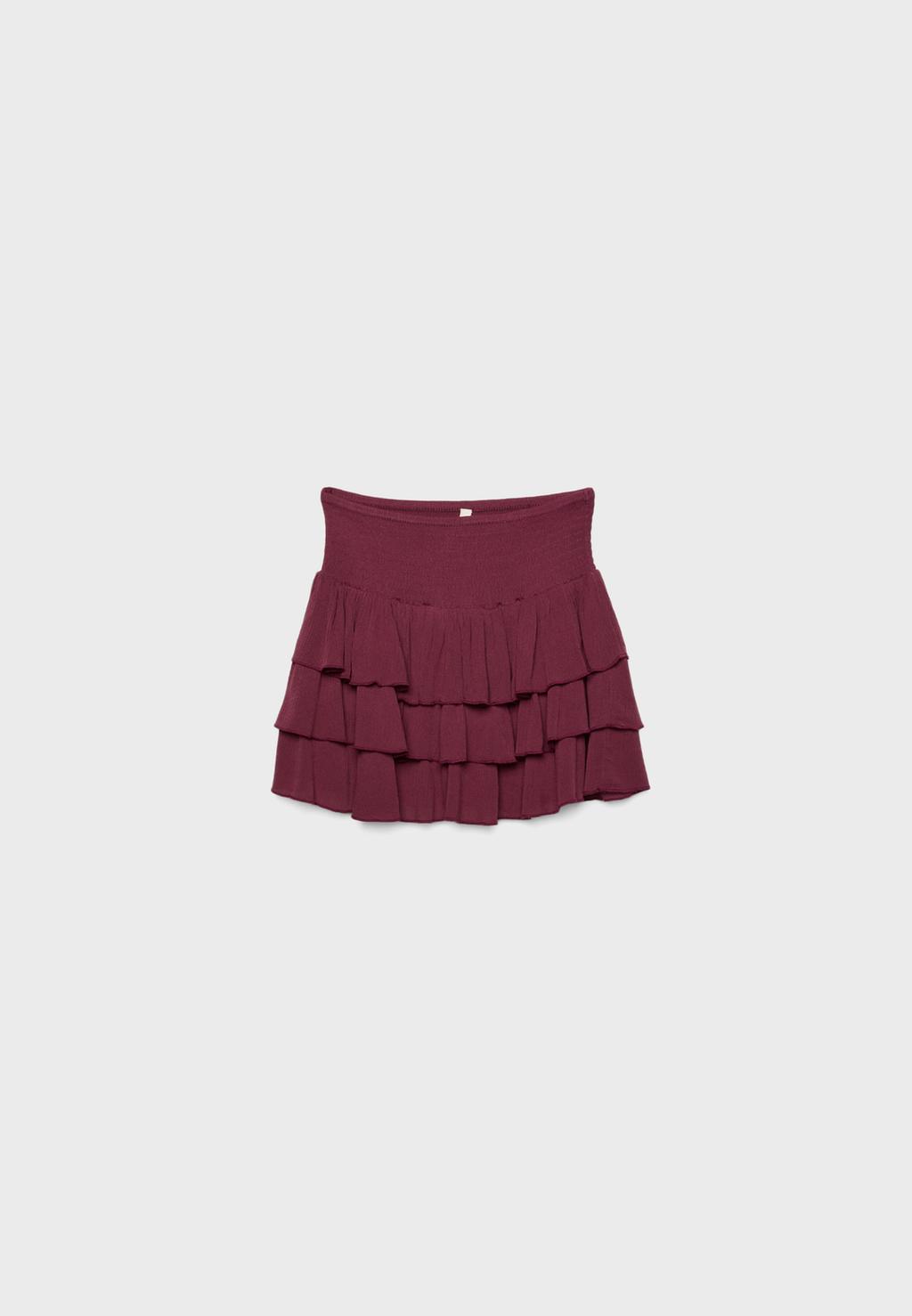 Jupe courte à volants et taille élastique