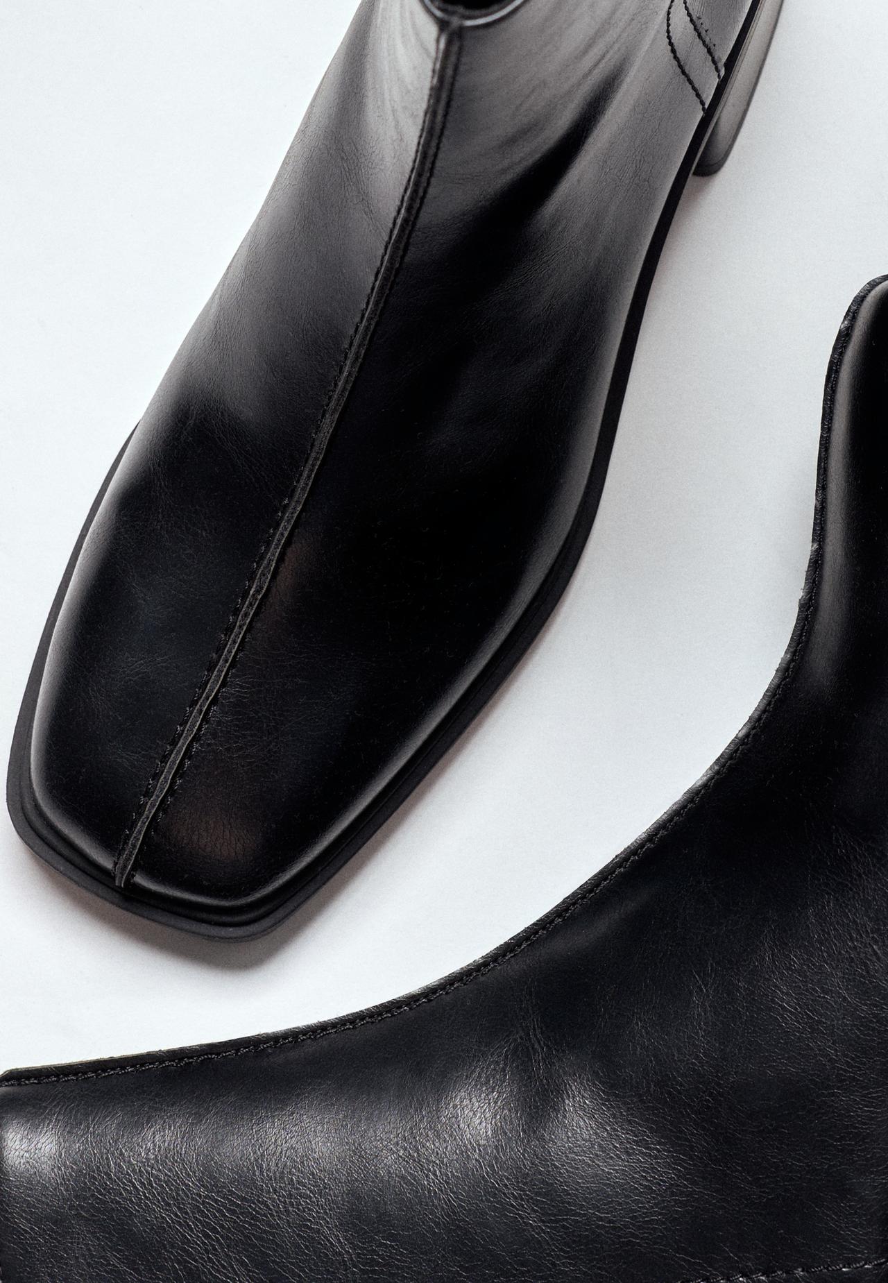 Flat leather effect ankle boots — BLACK