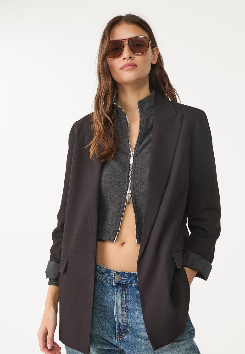 Soepelvallende open blazer