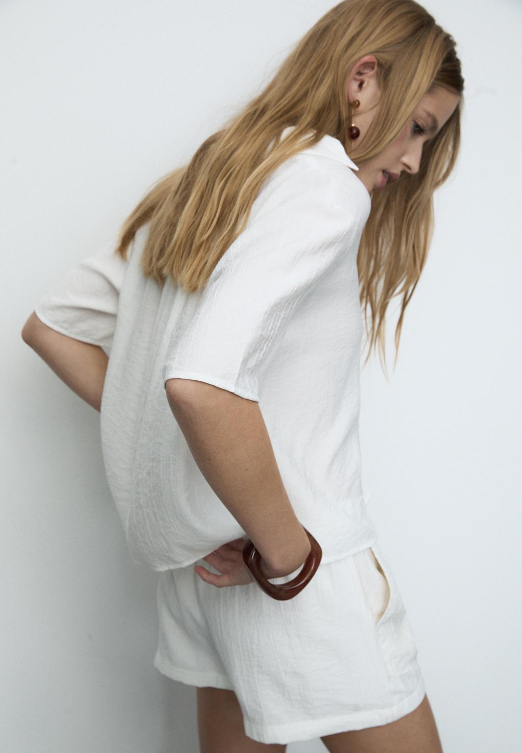 Shorts fluido textura