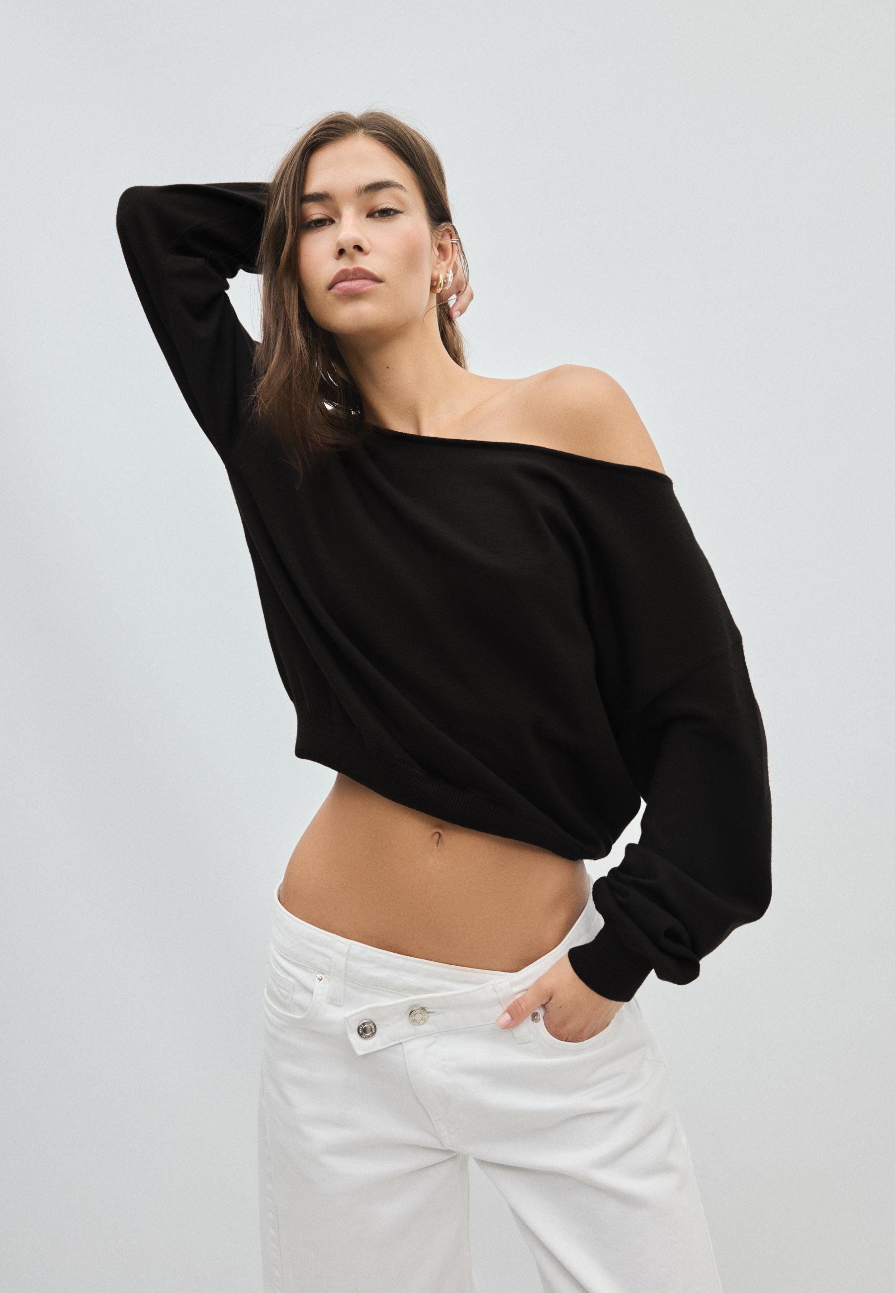 Asymmetric knit sweater — Black
