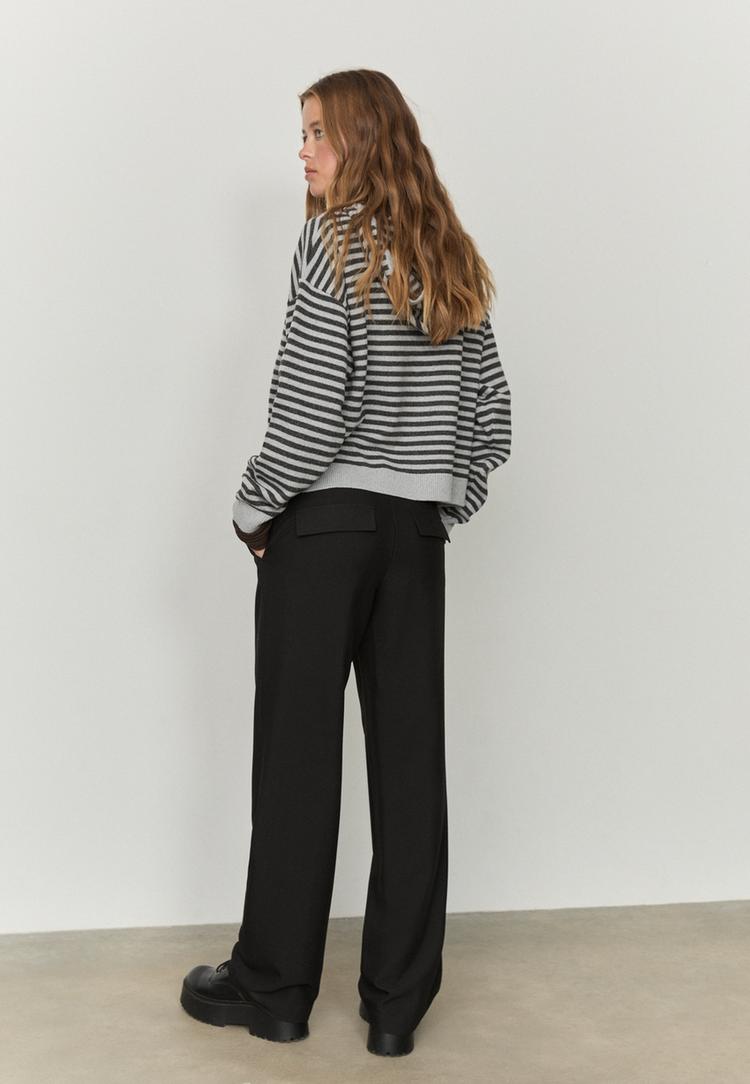pantaloni eleganti con tasche