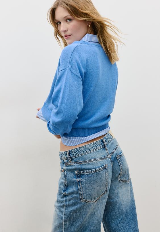 tricot trui in twee materialen