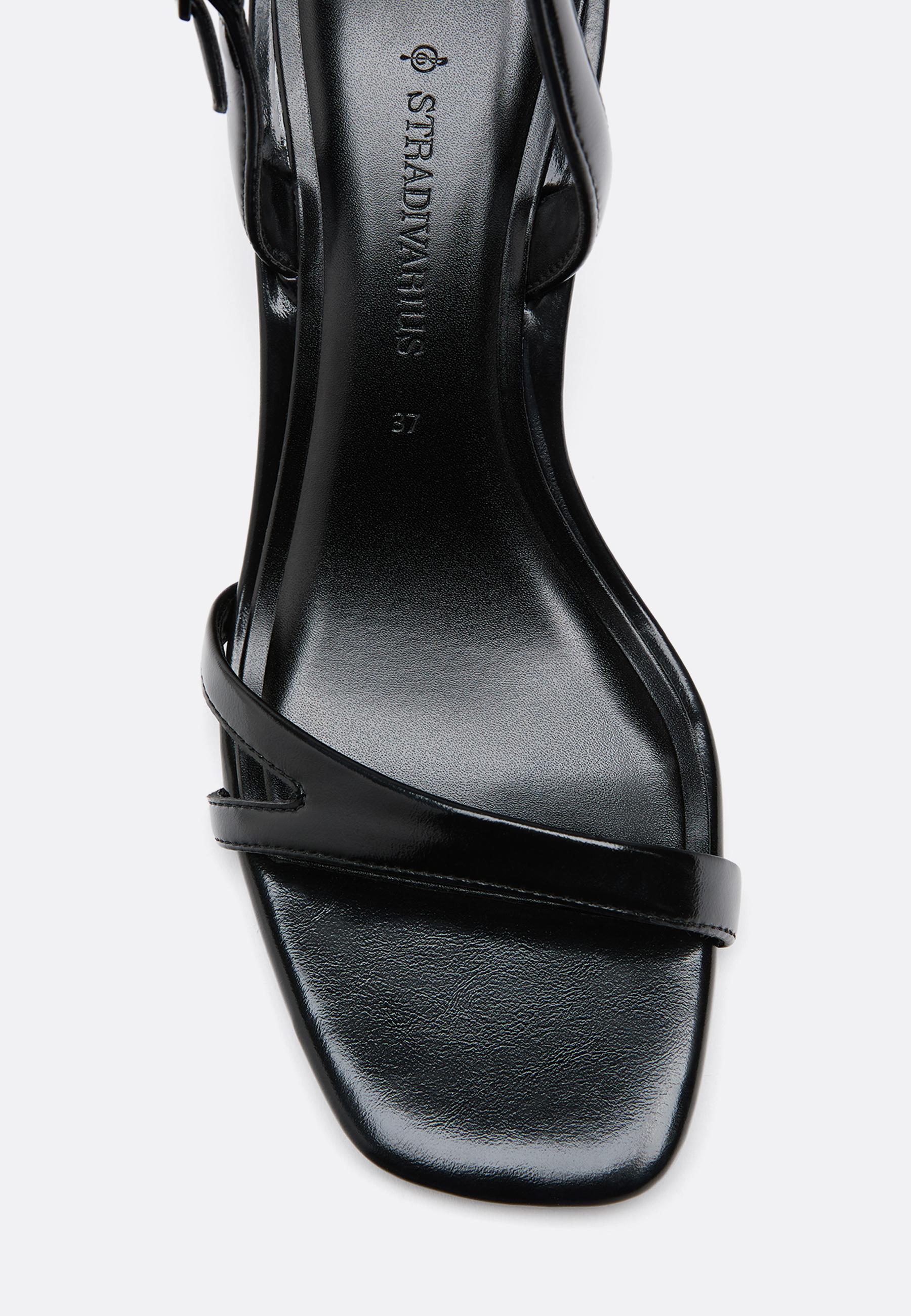 Heeled cut-out strap sandal — BLACK