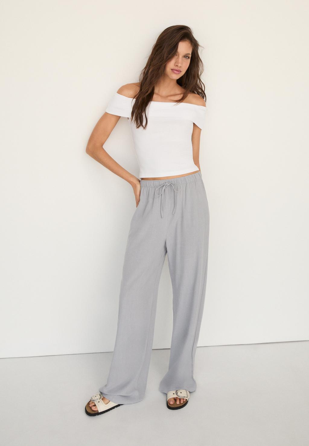 Loose-fitting linen blend trousers