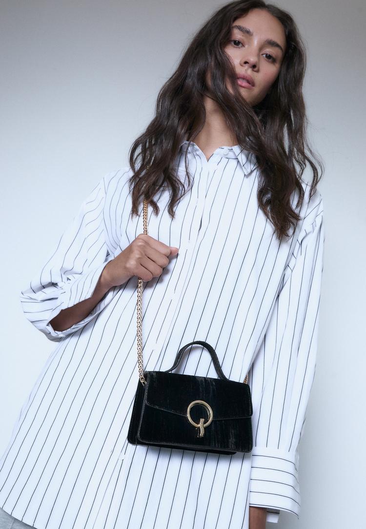 sac bandouliere en velours avec fermoir rond